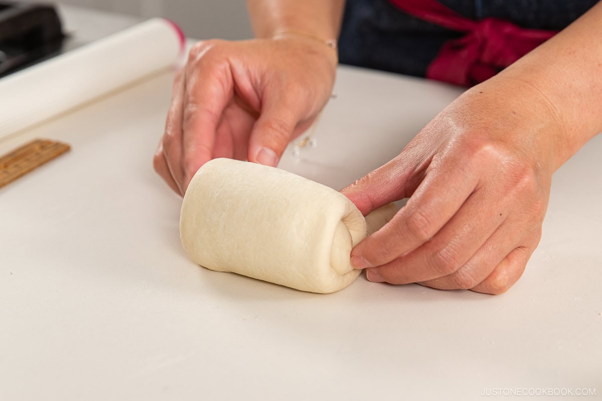 Rolling the dough.