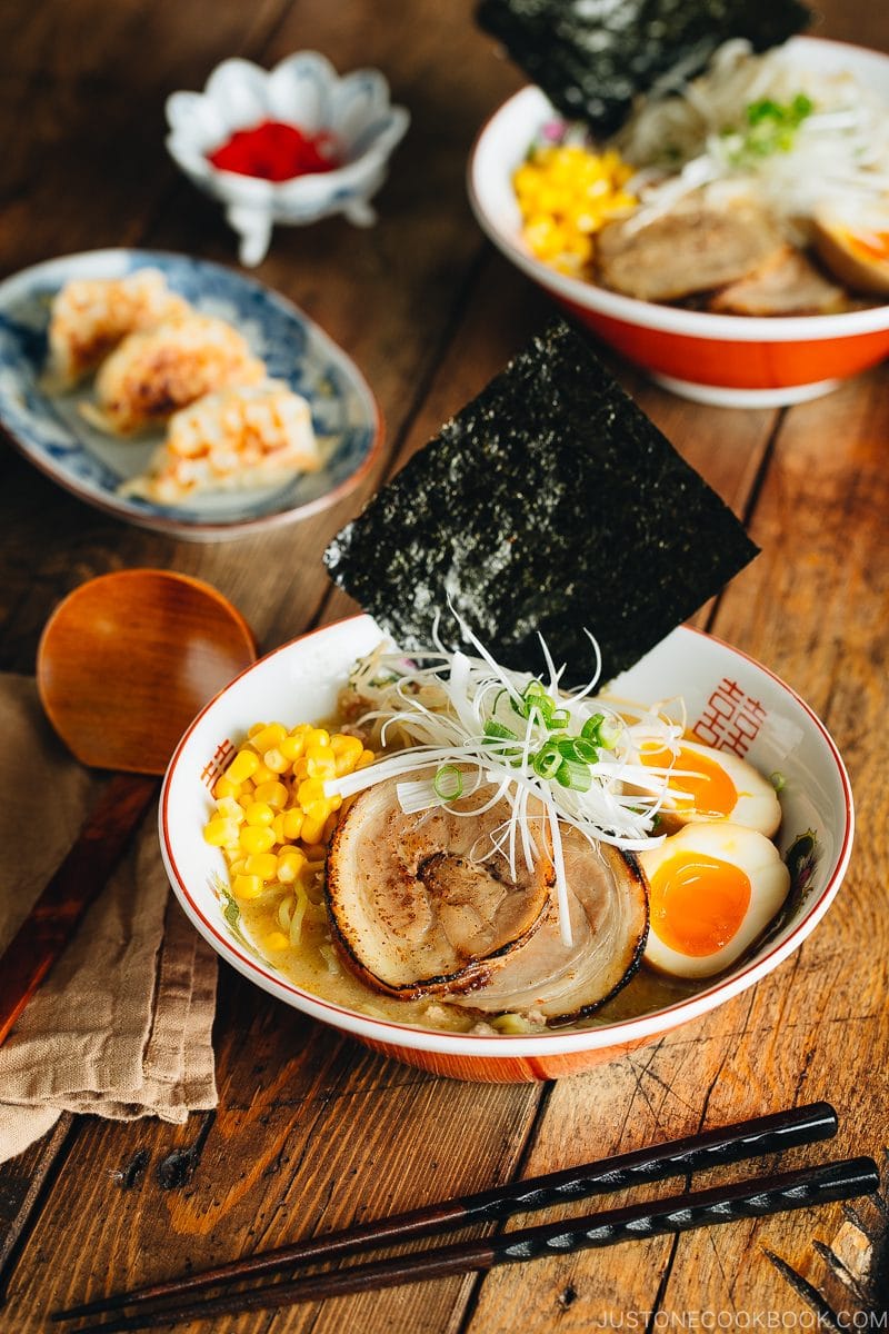 Miso ramen with homemade chashu and ramen egg garnished with nori.