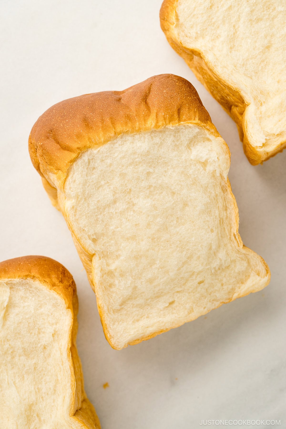Japanese milk bread (shokupan) slices showing the cross sectional view.