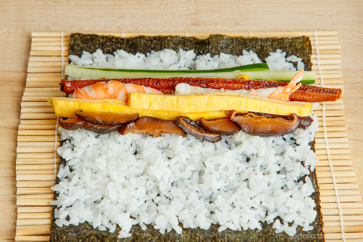 Place the sushi fillings over the rice.