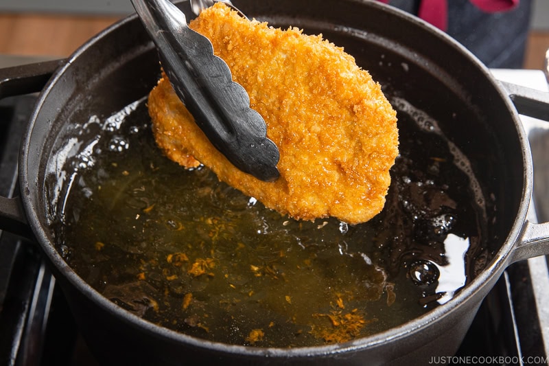 Finishing the deep frying the first round.