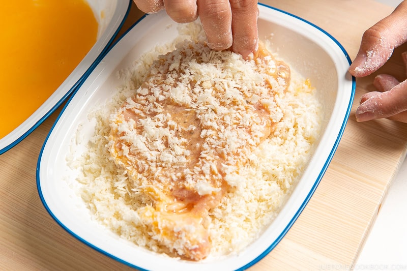 Dredge the cutlets in flour, then the egg mixture, then the panko mixture. 