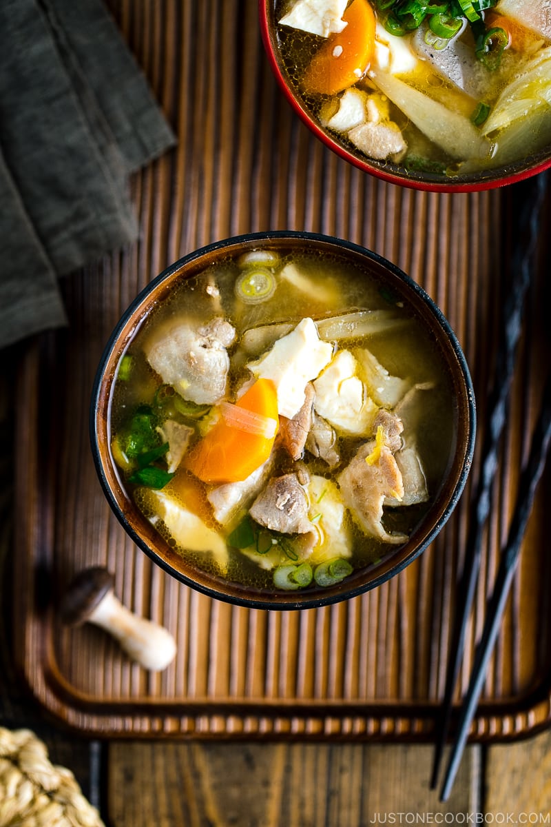 Wooden miso soup bowls containing Tonjiru (Pork and Vegetable Soup).