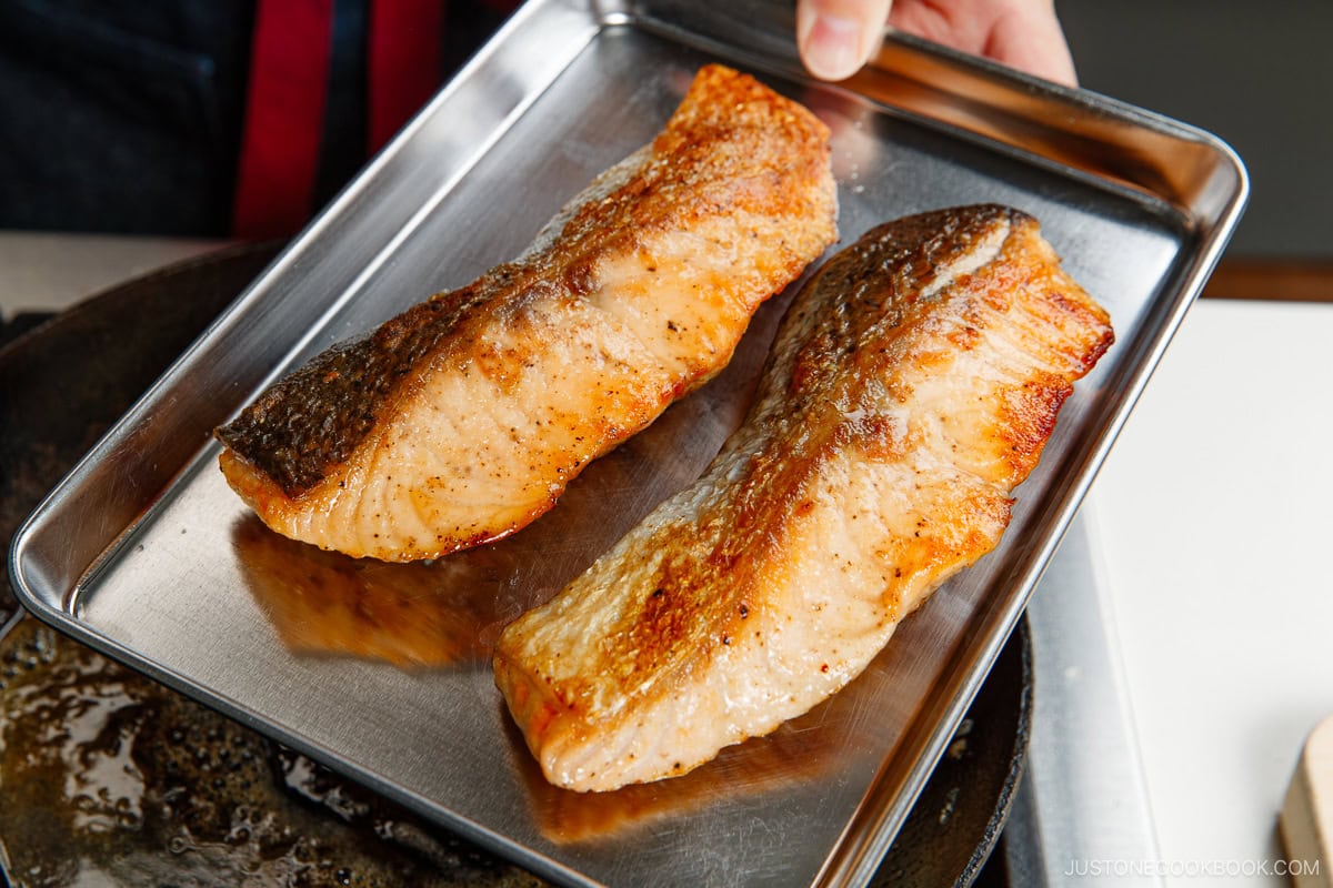 Remove the salmon from the pan.