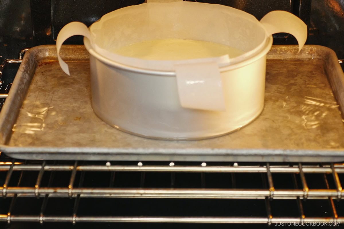 Place the cake pan in the water bath.