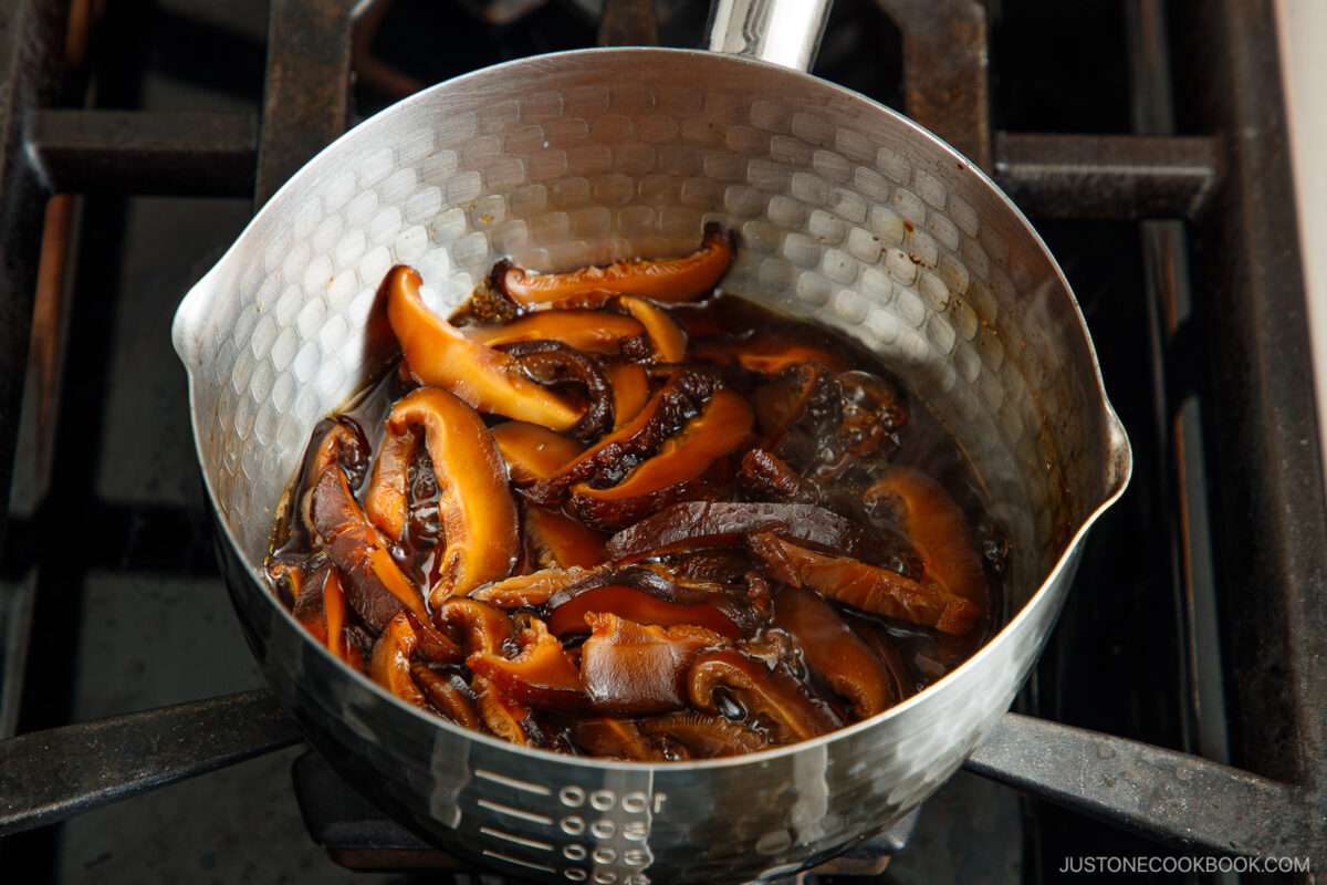 Simmer the shiitake mushrooms until liquid is almost gone.