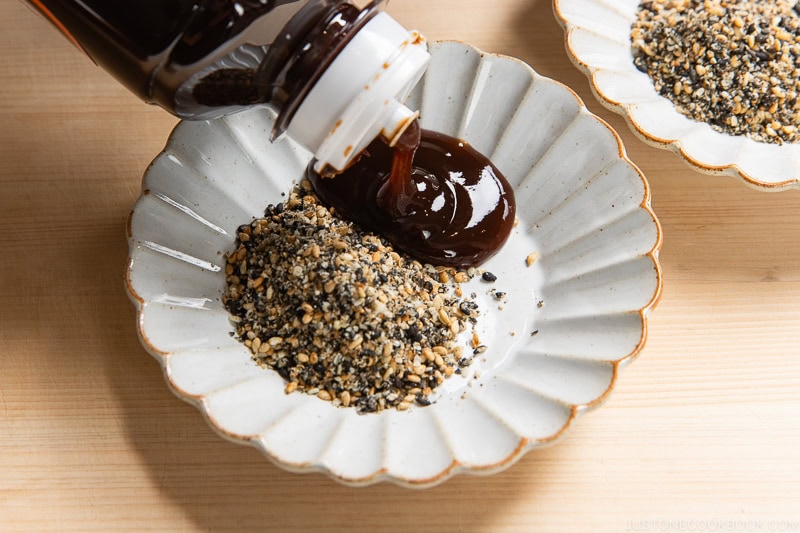 Pour the tonkatsu sauce to the dish.