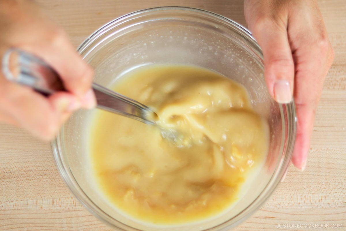 Mixing the miso marinade in a bowl.