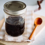 A mason jar filled with Homemade Teriyaki Sauce.