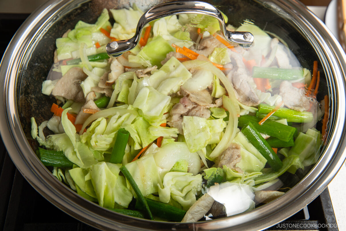 Stir fry the vegetables and cook covered.