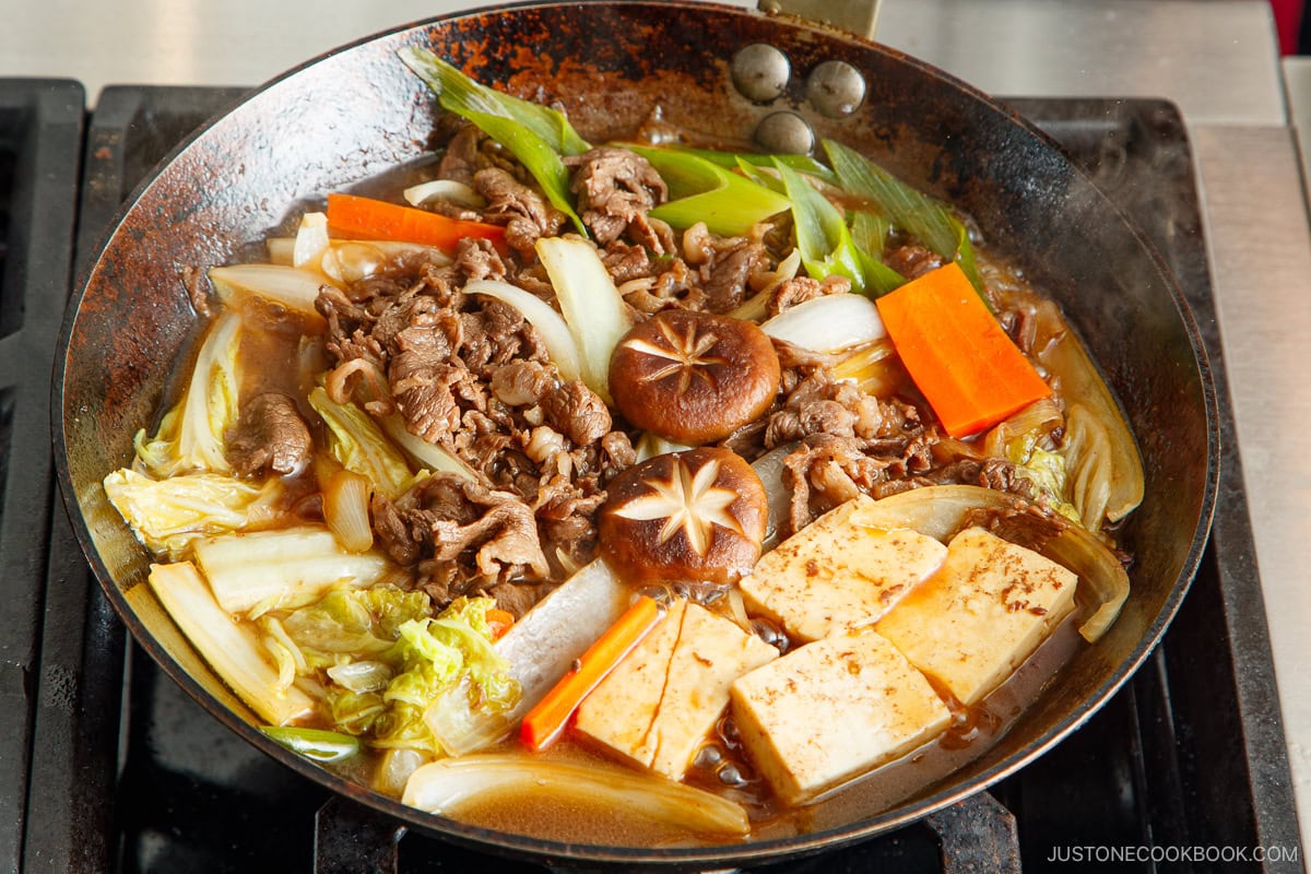 Sukiyaki is simmering in the pan