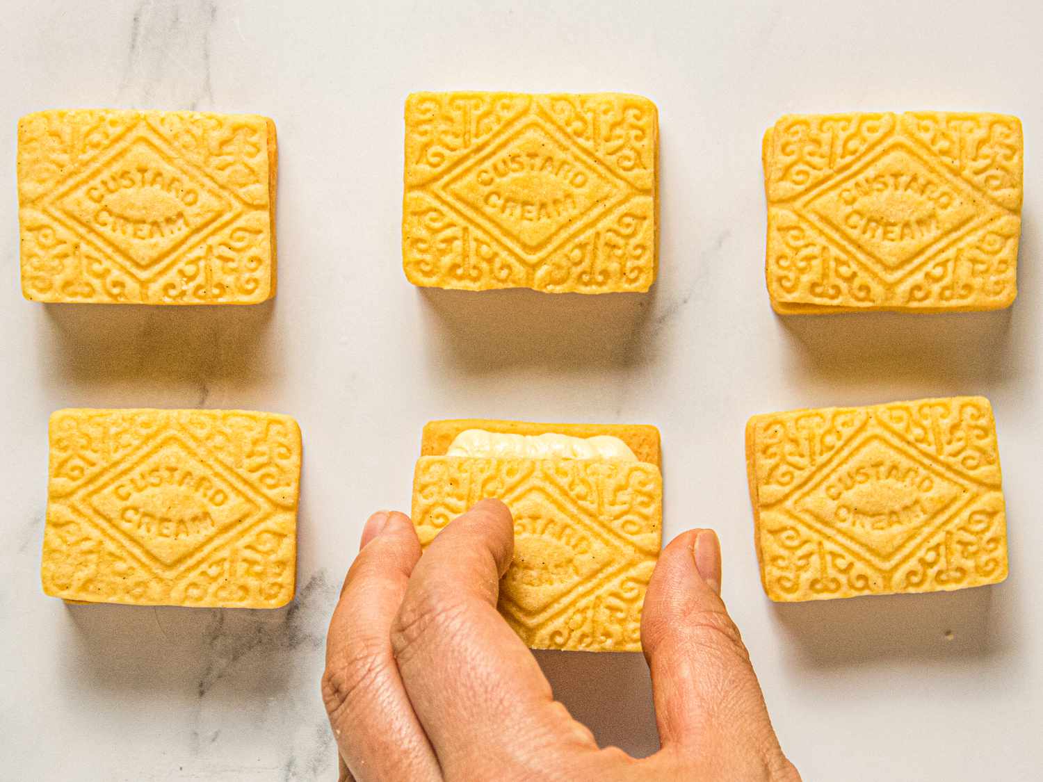Overhead view of closing custard creams