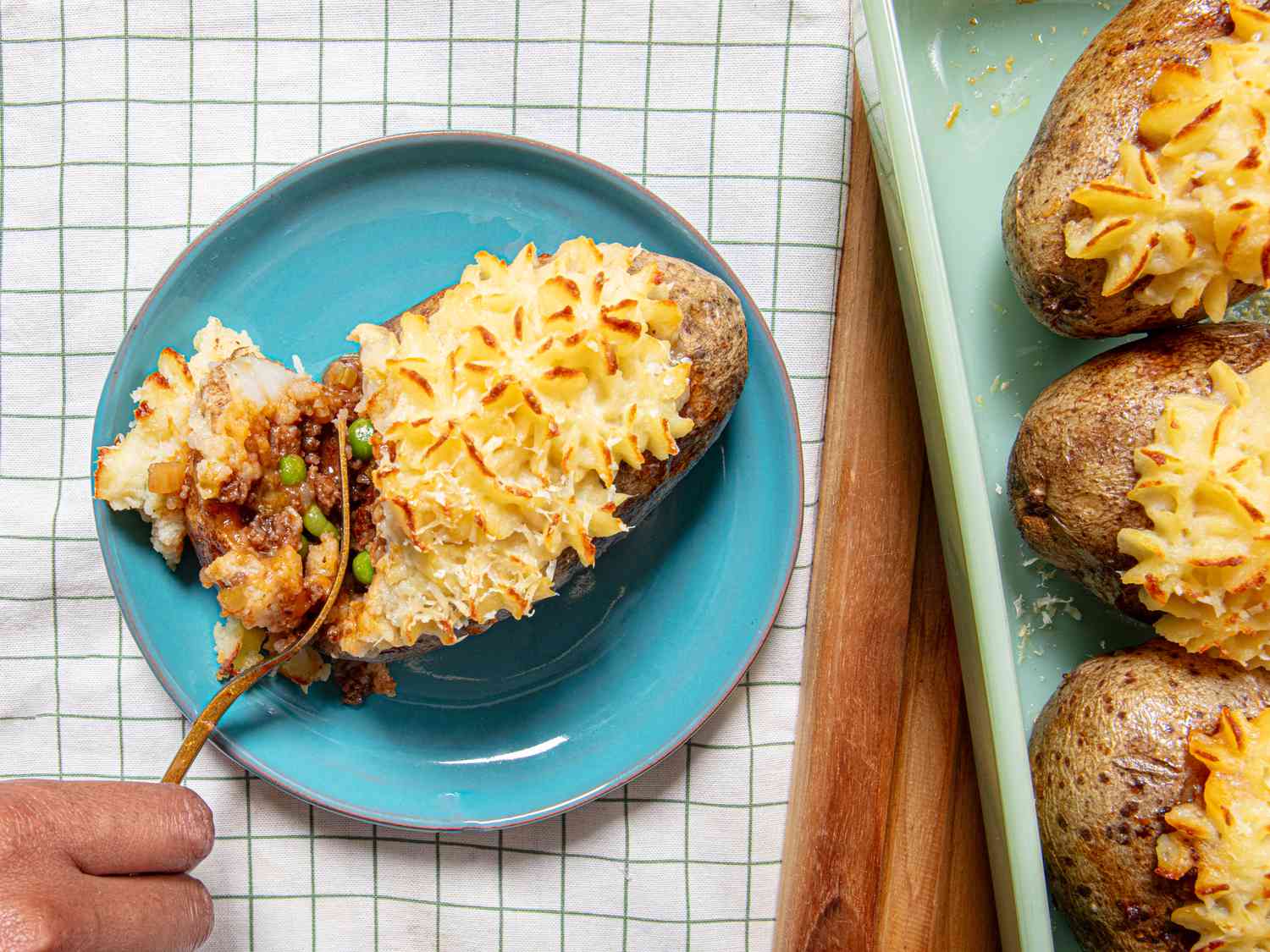 Overhead view of shepherd's pie baked potatoes