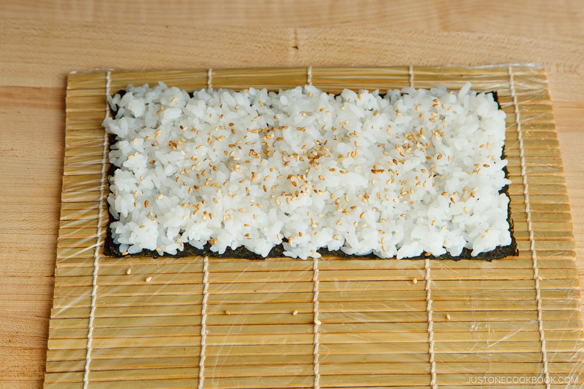 Put the sushi rice on nori sheet.