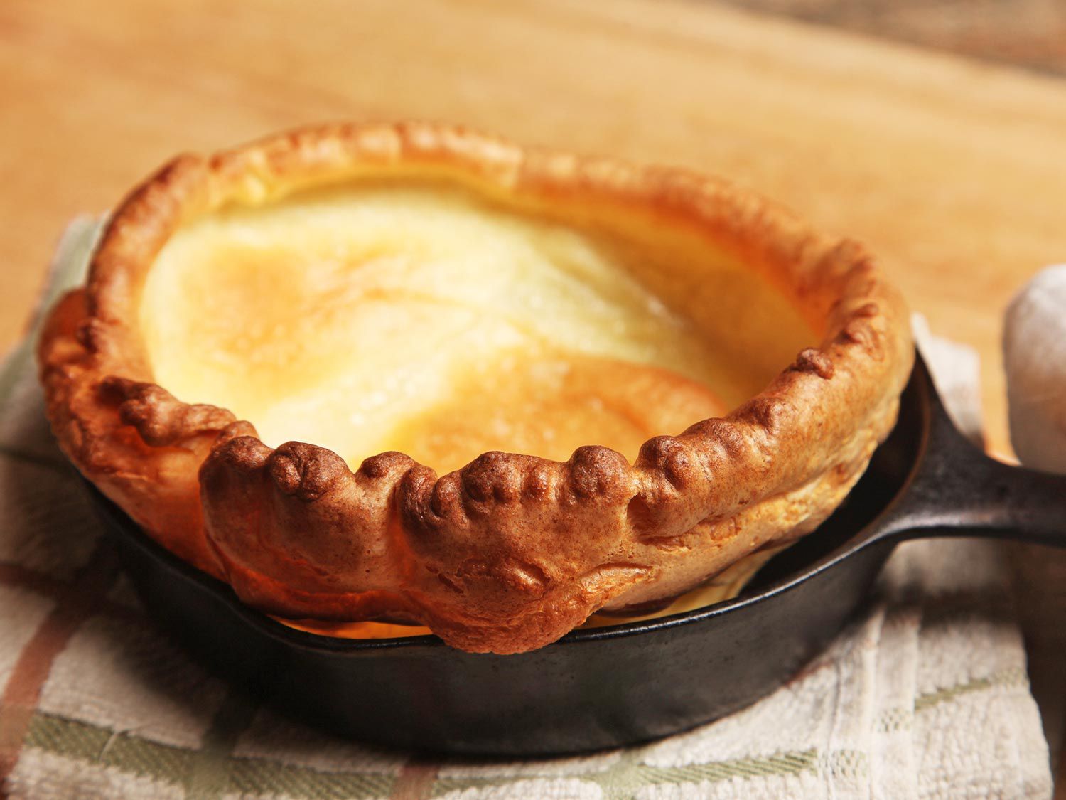 Large yorkshire pudding in a cast iron skillet