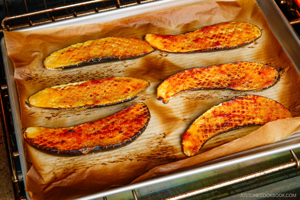 Miso glazed eggplant on the baking sheet.