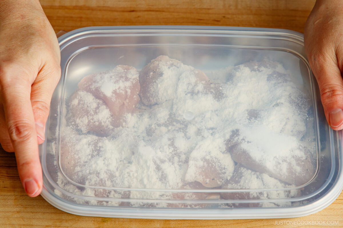Coat the chicken with flour in the prep tray.