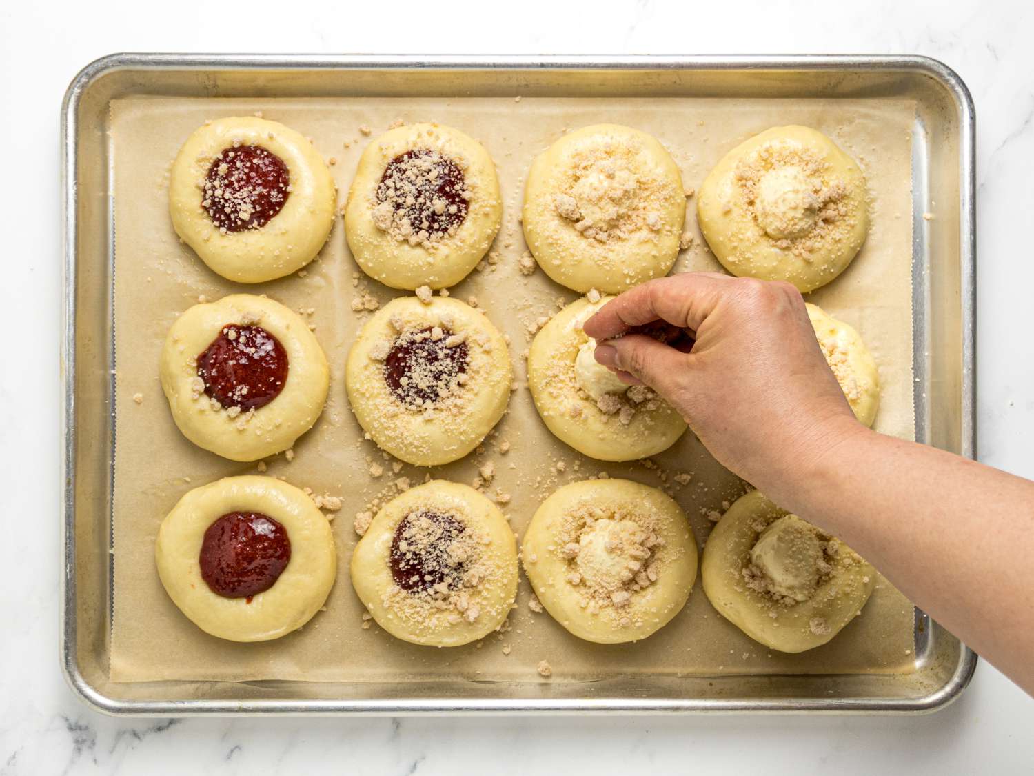  sprinkling strudel on top of Kolaches 