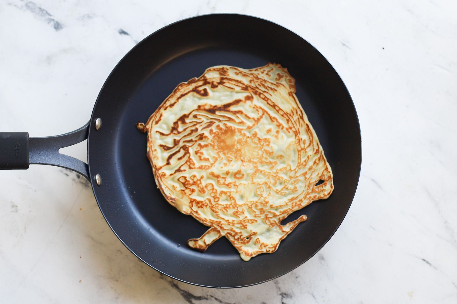 a crepe in the oxo pan