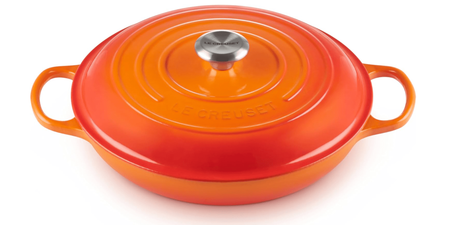 An orange Le Creuset braiser