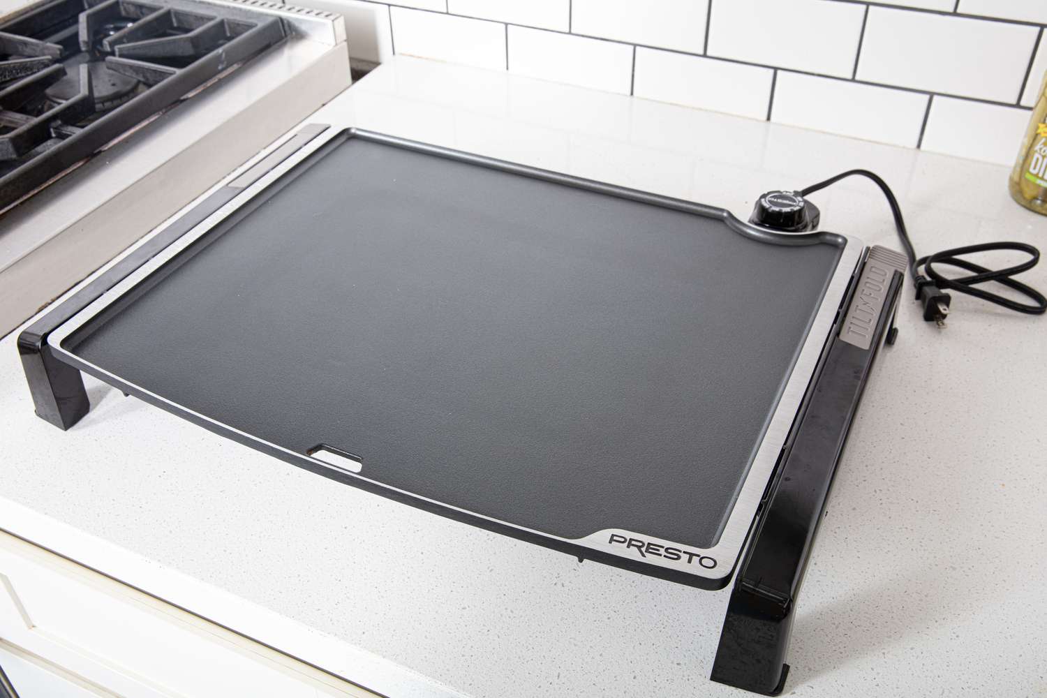 presto tilt and fold griddle on a countertop