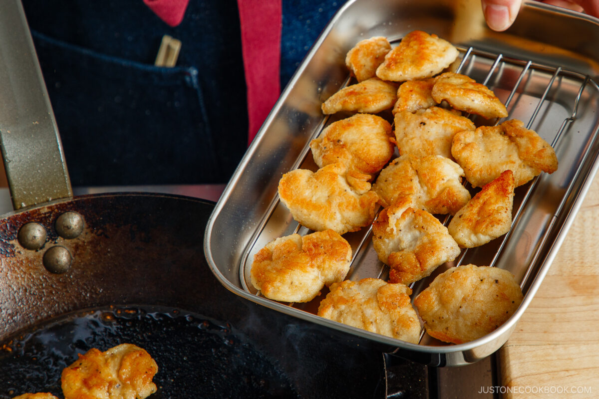 Transferring the chicken.