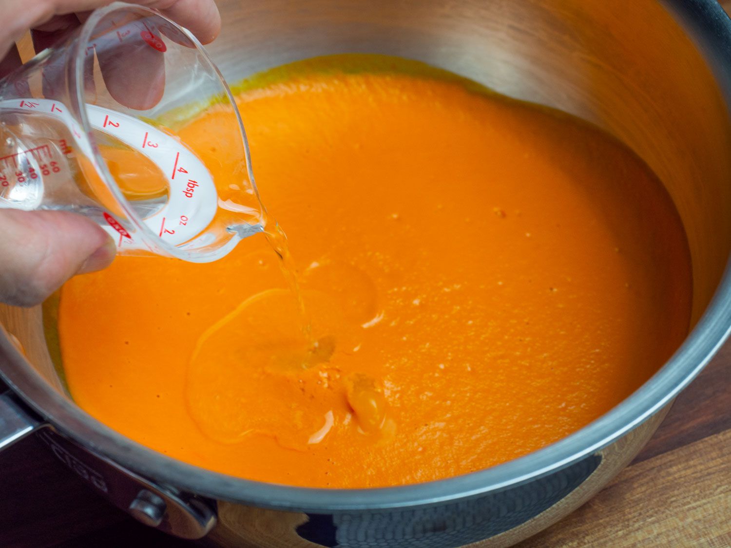 Adding the vodka to the sauce before the pasta goes in.