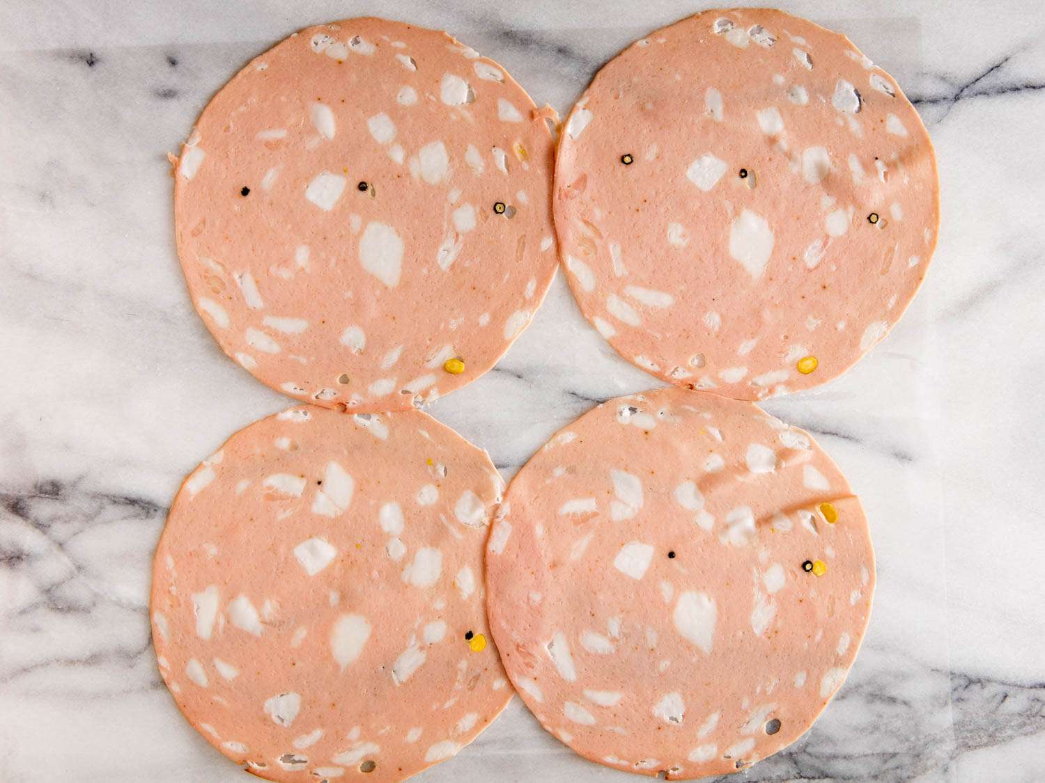 Slices of mortadella