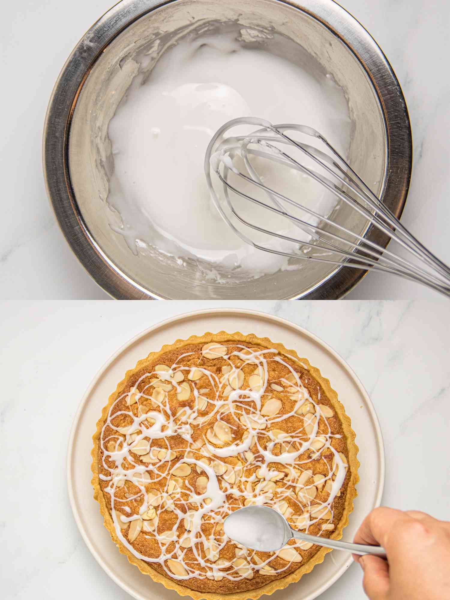 Metal mixing bowl with icing being whisked, finished bakewell tart decorated with icing and a spoon