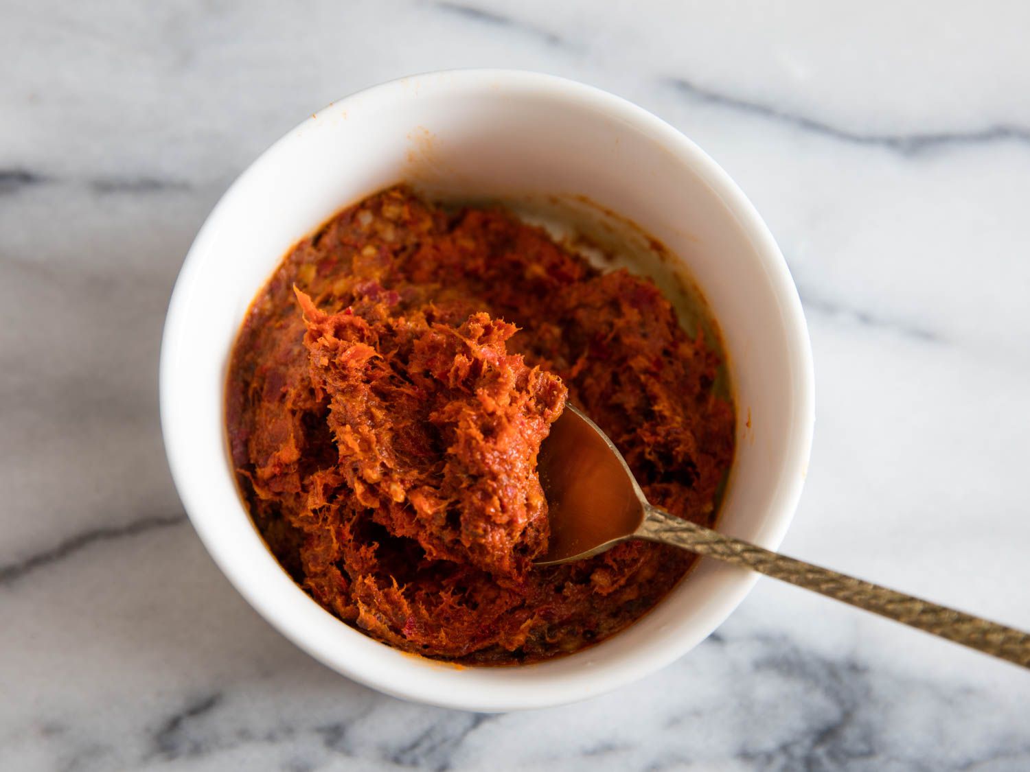 Taking a spoonful of 'nduja
