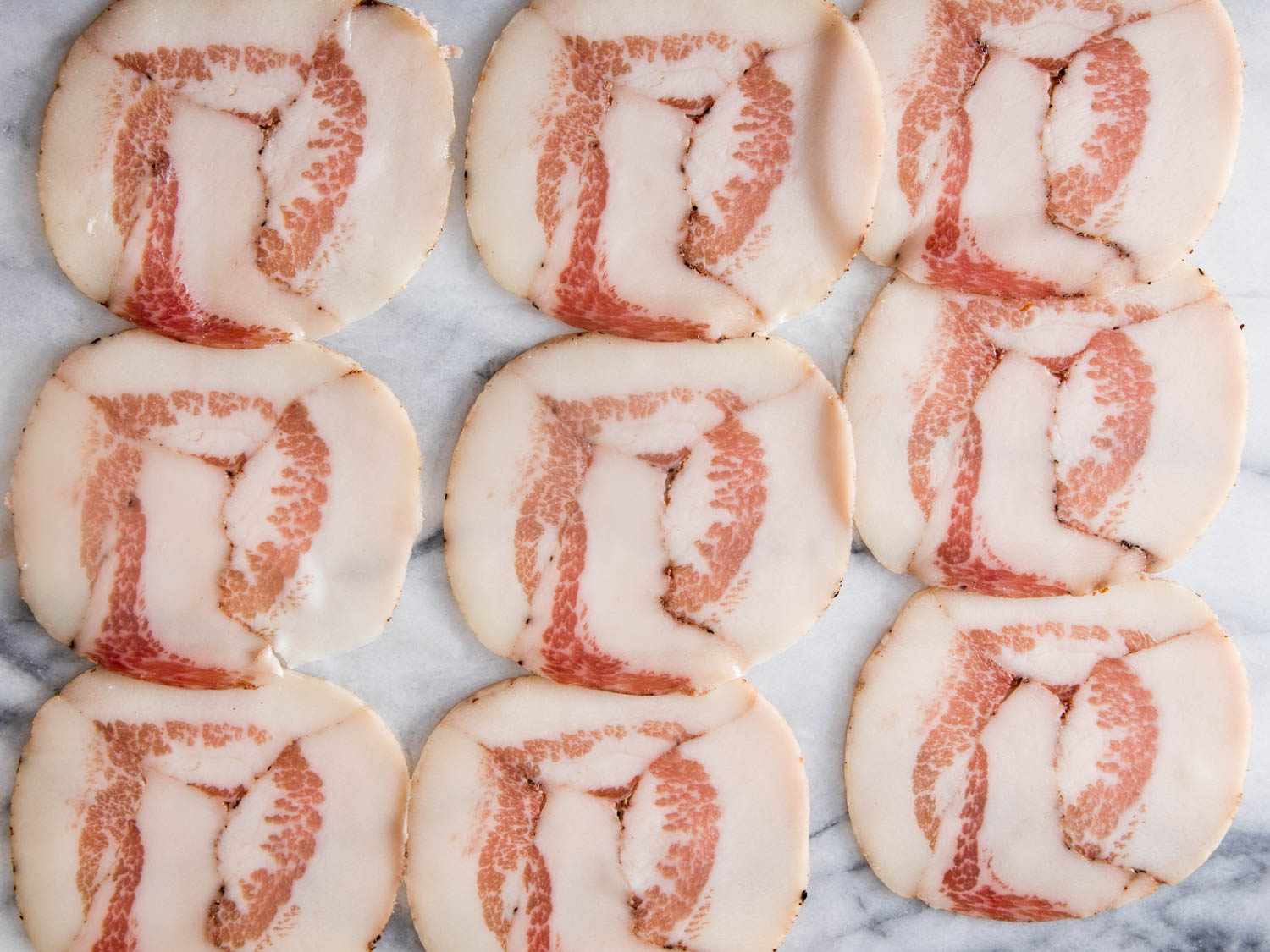 fatty thin slices of guanciale