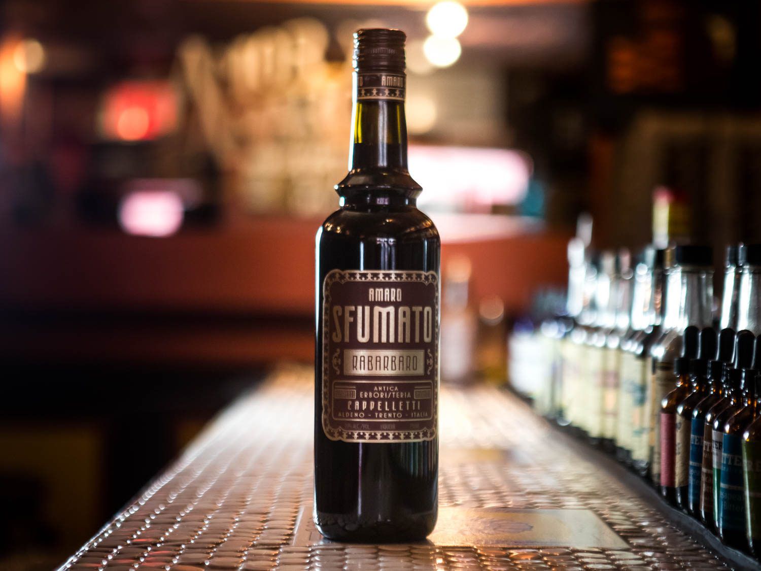 A bottle of Sfumato on a bar counter. 