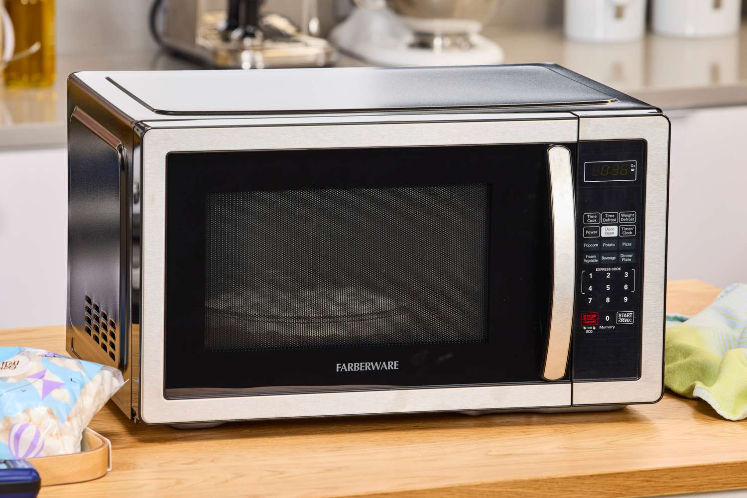 Marshmallows in a bowl heating in the Farberware Countertop Compact Microwave (FMWO11AHTBKB) 