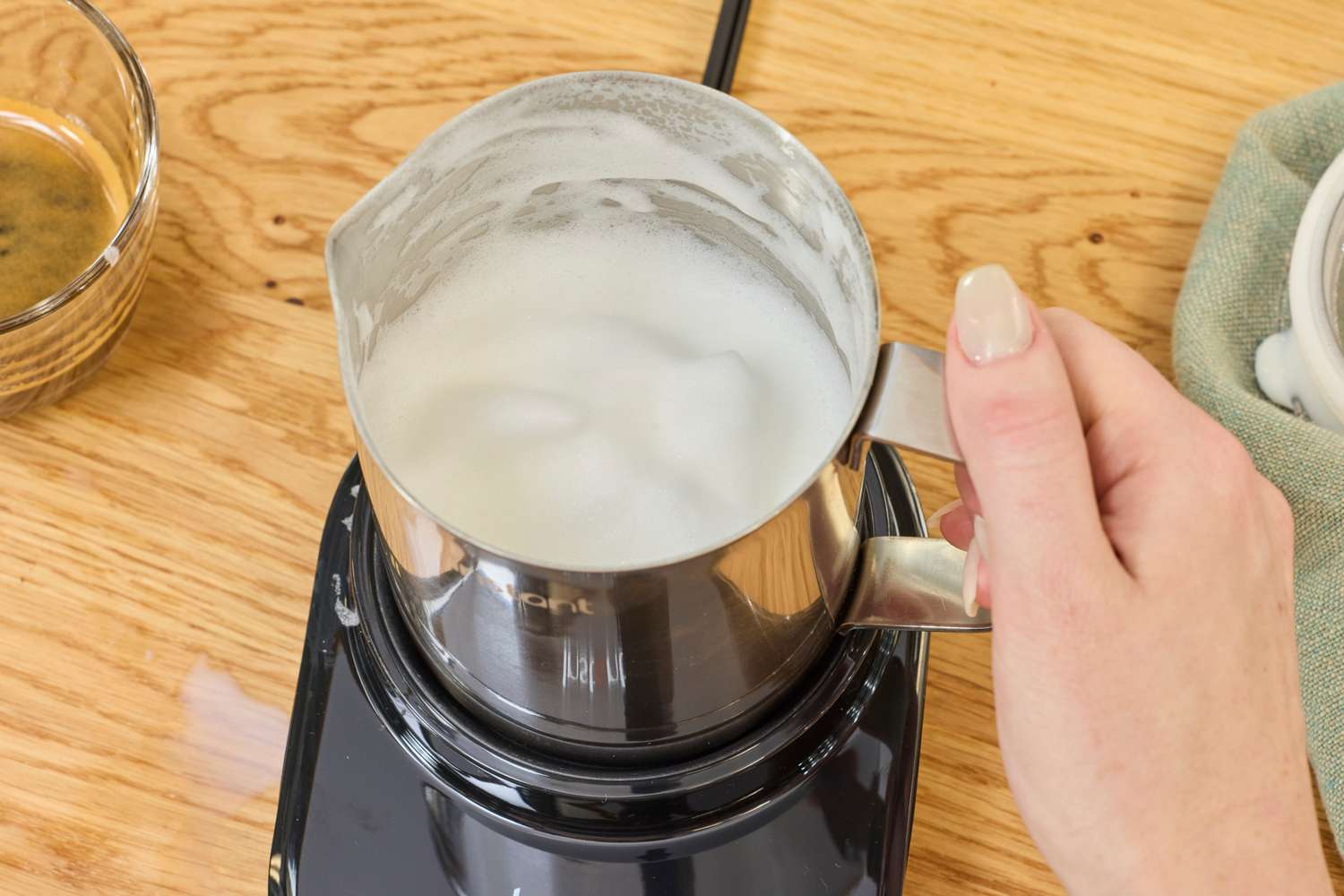 Frothed milk in the Instant Pot's pitcher.