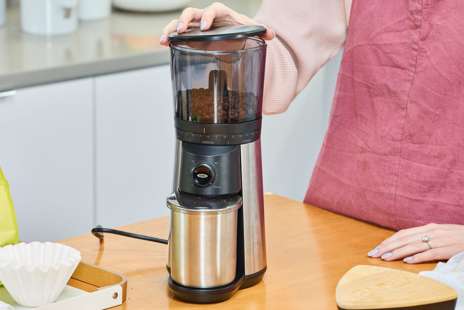 Coffee is ground in the OXO Brew Conical Burr Coffee Grinder