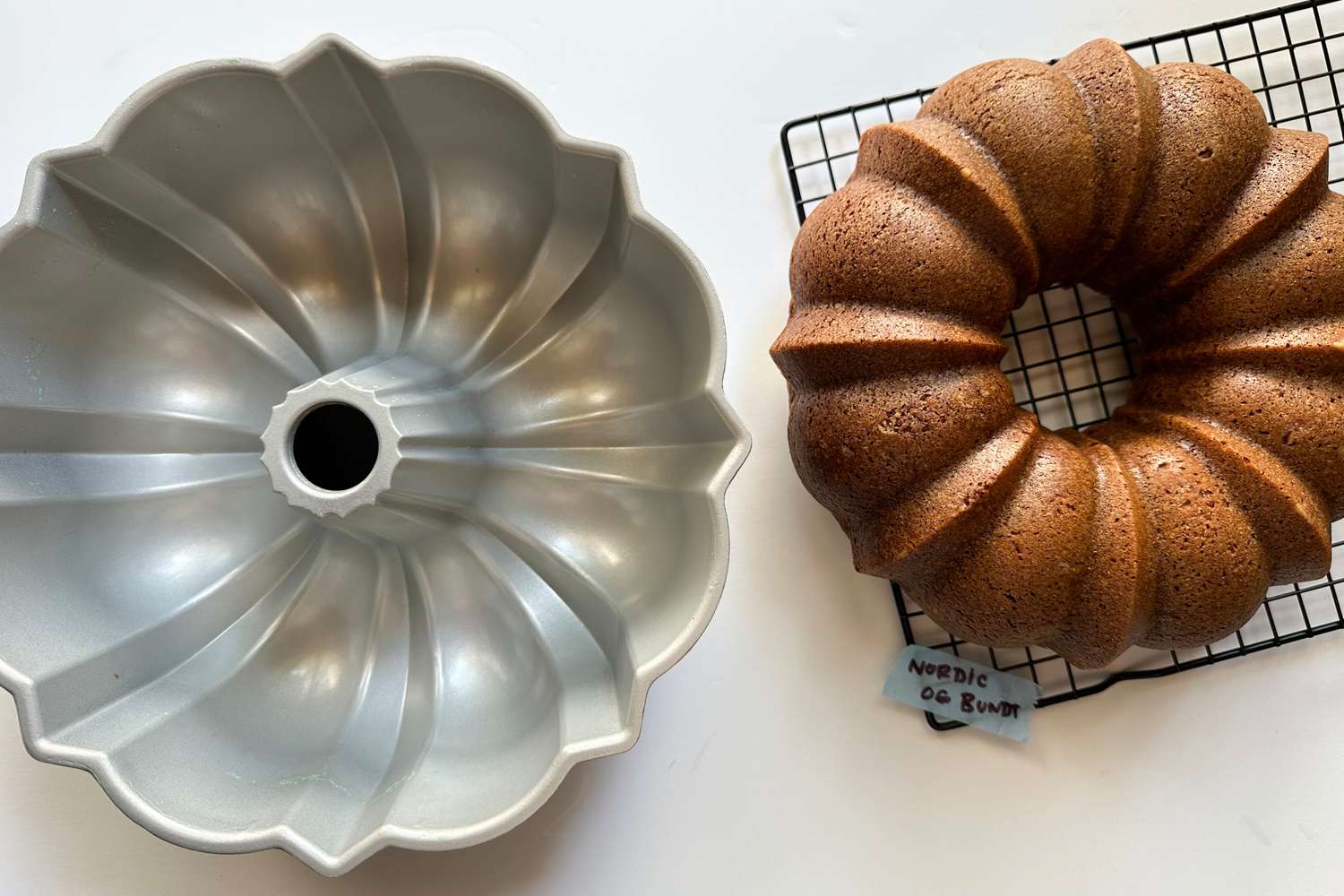 Nordic Ware Platinum Collection with a Punt Cake next to it