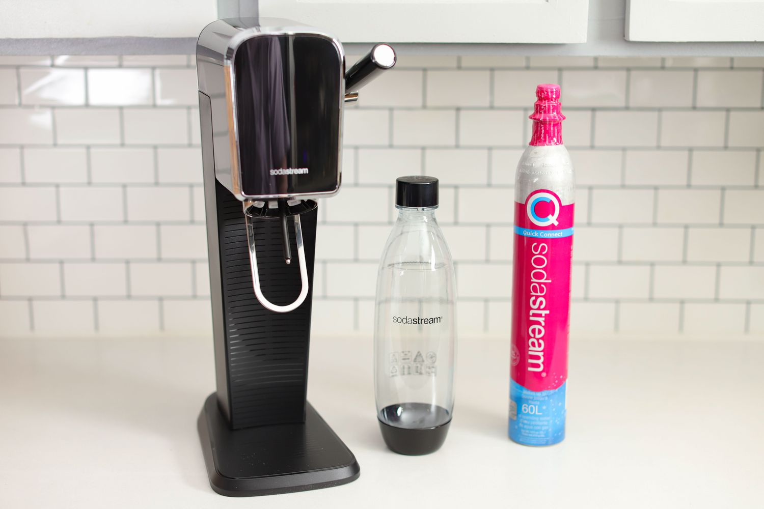 SodaStream Art Sparkling Water Maker, bottle, and canister displayed on a counter